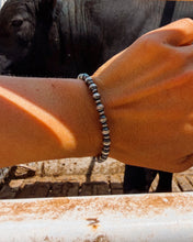 Load image into Gallery viewer, Wild Pony Rondelle and 6mm Navajo Style Pearl Bracelet
